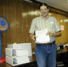 Ken Kalloch holding the first draft of the Kalloch Genealogy book at the Kalloch Reunion 8/17/02